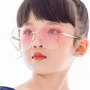 Stylish rimless polygonal sunglasses for kids featuring pink gradient lenses and metal frames