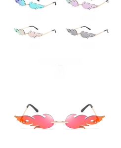 Detail view of flame-shaped rimless sunglasses in five metallic colors for party wear