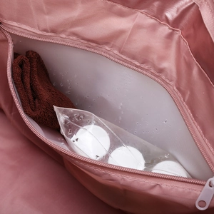 Pink waterproof fitness bag with a zipper wet-dry separation pocket and water drops detail