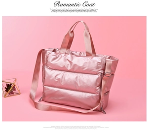 Pink quilted puffer gym bag with waterproof material and glossy finish for women