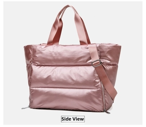 Detailed side view of pink metallic quilted gym bag with shoulder strap and waterproof fabric