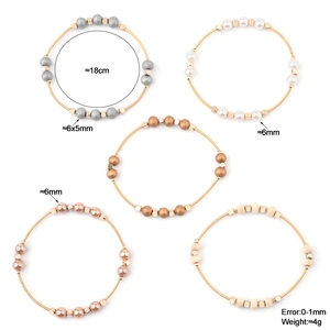 Set of 5 stretch metal spring bracelets with 6mm colorful wood beads and pearls