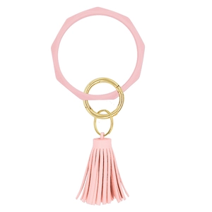 Pink diamond-textured silicone bracelet keychain with fringe tassel and gold metal ring