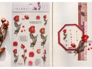 Detail showing PET transparent red rose floral stickers for DIY journals and crafts