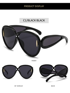 Vues détaillées de lunettes de soleil noires oversize avec détails en métal doré