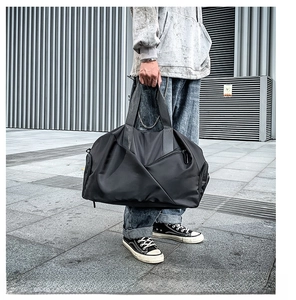 Detail of waterproof nylon duffle bag with unique geometric folding and hidden zipper pocket