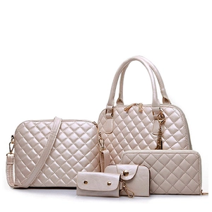 5-piece champagne gold quilted handbag set including tote, crossbody, and wallets