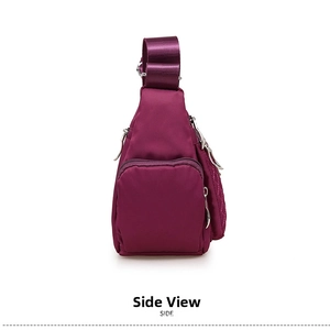 Side view of deep purple nylon crossbody bag with multi-pocket zipper detail