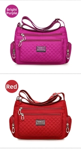 Detailed view of two nylon crossbody bags with diamond quilted stitching and multiple zippers