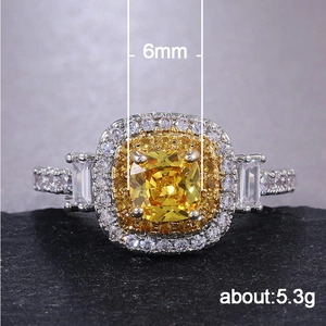 Bague halo de luxe avec zircon jaune, taille radiant et accents brillants sur le côté