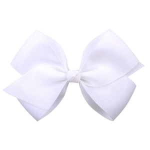 Detail of white grosgrain ribbon hair bow showing double-layered texture and tied knot