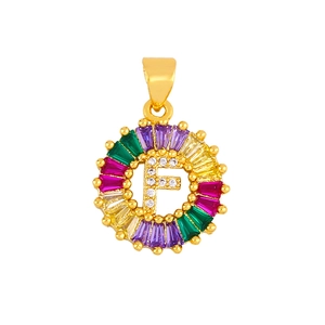 Detailed macro view of gold letter F pendant with colorful zircon stones and micro-inlay