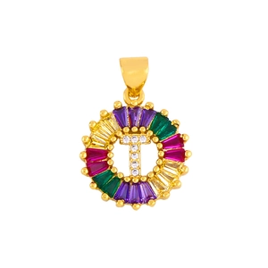 Macro detail of a round golden pendant with colorful zircons and a centered letter T