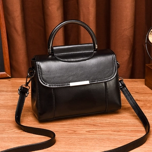 Vintage black PU leather handbag with litchi texture and silver metal handle