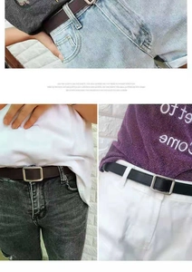 Detail view of thin PU leather belts with silver buckles on various denim styles
