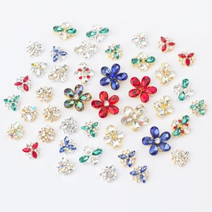 Mix of colorful crystal flower nail art charms with metal base in various sizes