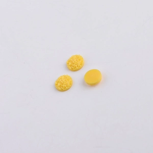 Detailed macro view of 8mm yellow resin crystal druzy beads for DIY jewelry making