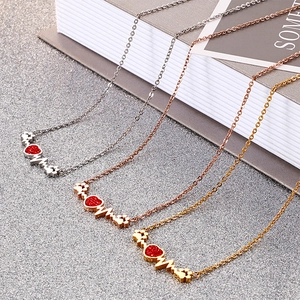 Collier patte de chat en argent or et or rose avec pendentif cœur rouge à paillettes