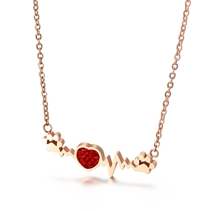 Collier en acier rose doré avec ligne de battement de coeur et pendentif patte de chien