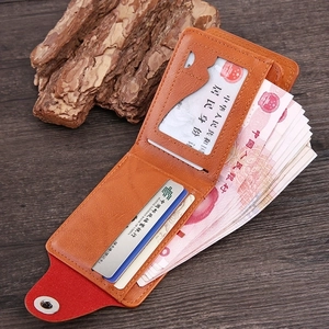 Short vintage brown leather bi-fold wallet with dollar pattern and multi-card slots