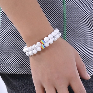 Double-layered white turquoise beaded bracelet with rainbow stones worn on wrist