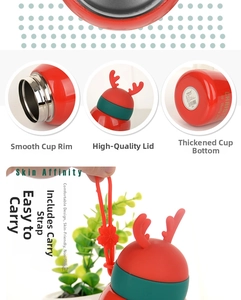 Detail of red Christmas thermos with cute reindeer antlers and silicone handle strap