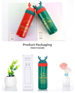 Close-up of red and green Christmas reindeer insulated bottles with festive reindeer antlers