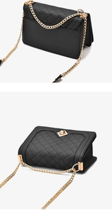 Detail view of black quilted chain bag featuring golden hardware and leather texture