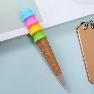 Close-up of creative four-layer colorful ice cream cone shaped gel pen on a desk