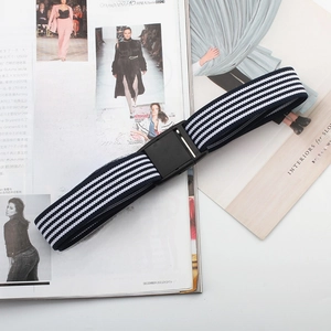 Detailed view of elastic blue and white striped belt with black buckle on a magazine