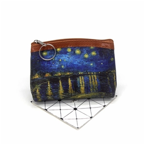 Macro detail of canvas texture on coin purse featuring Starry Night oil painting