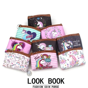 Stack of 8 colorful unicorn coin purses with zippers and metallic keyrings