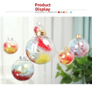 Clear plastic Christmas ornament with colorful feathers and decorative metal cap detail
