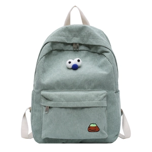 Light green corduroy backpack with cute cartoon eyes and mountain embroidery detail
