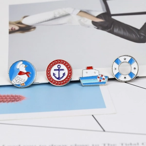 Set of four nautical enamel pins featuring a seagull, anchor, ship, and lifebuoy