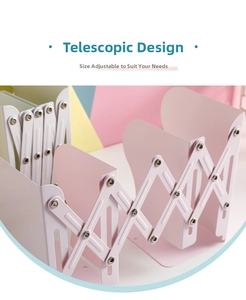 Close-up of pink expandable metal bookend with adjustable X-shaped structure for desks