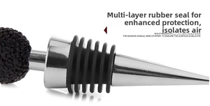 Detail view of 304 stainless steel wine stopper with black rhinestones and seal rings