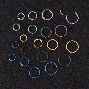 Twisted stainless steel seamless rings in multiple colors and sizes for piercing
