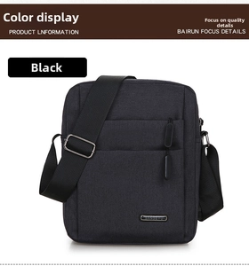 Close-up of black oxford cloth shoulder bag featuring SANSEYU metal logo and zip pocket
