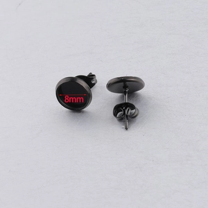 Detail view of 8mm black stainless steel circular stud earring base with size marking