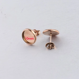 Detail of 10mm rose gold stainless steel earring blanks with flat round base and butterfly backs