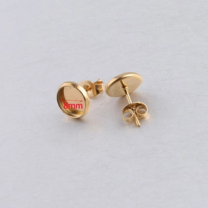 Detail view of 8mm gold plated stainless steel earring post with round flat base tray