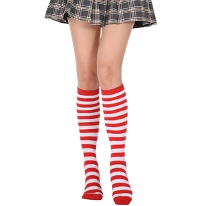 Detail of red and white striped knee high socks made from soft knitted fabric