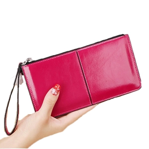 Elegant rose red faux leather long zipper wallet for women with wrist strap