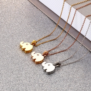 Three minimalist titanium steel elephant pendant necklaces in gold, rose gold and silver finish
