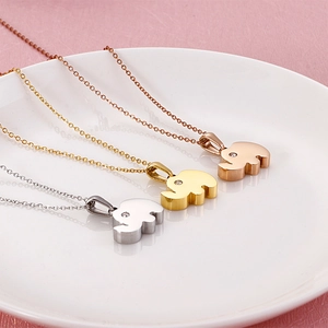 Elephant pendant necklaces in silver, gold, and rose gold with sparkling zircon stones