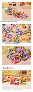 Nahaufnahme von Mini Radiergummis in Frucht und Zahlenform in bunten Farben