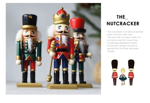 Detailed close-up of three handcrafted 15cm wooden nutcracker soldiers with gold accents