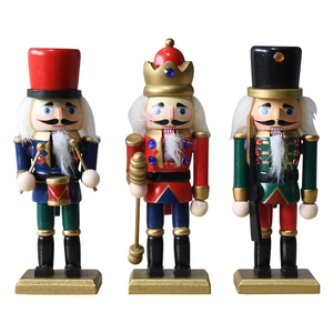 Set of three 15cm wooden Nutcracker soldier ornaments in red, blue, and green uniforms