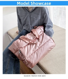 Detailed view of the rose gold quilted fitness bag showing glossy waterproof material